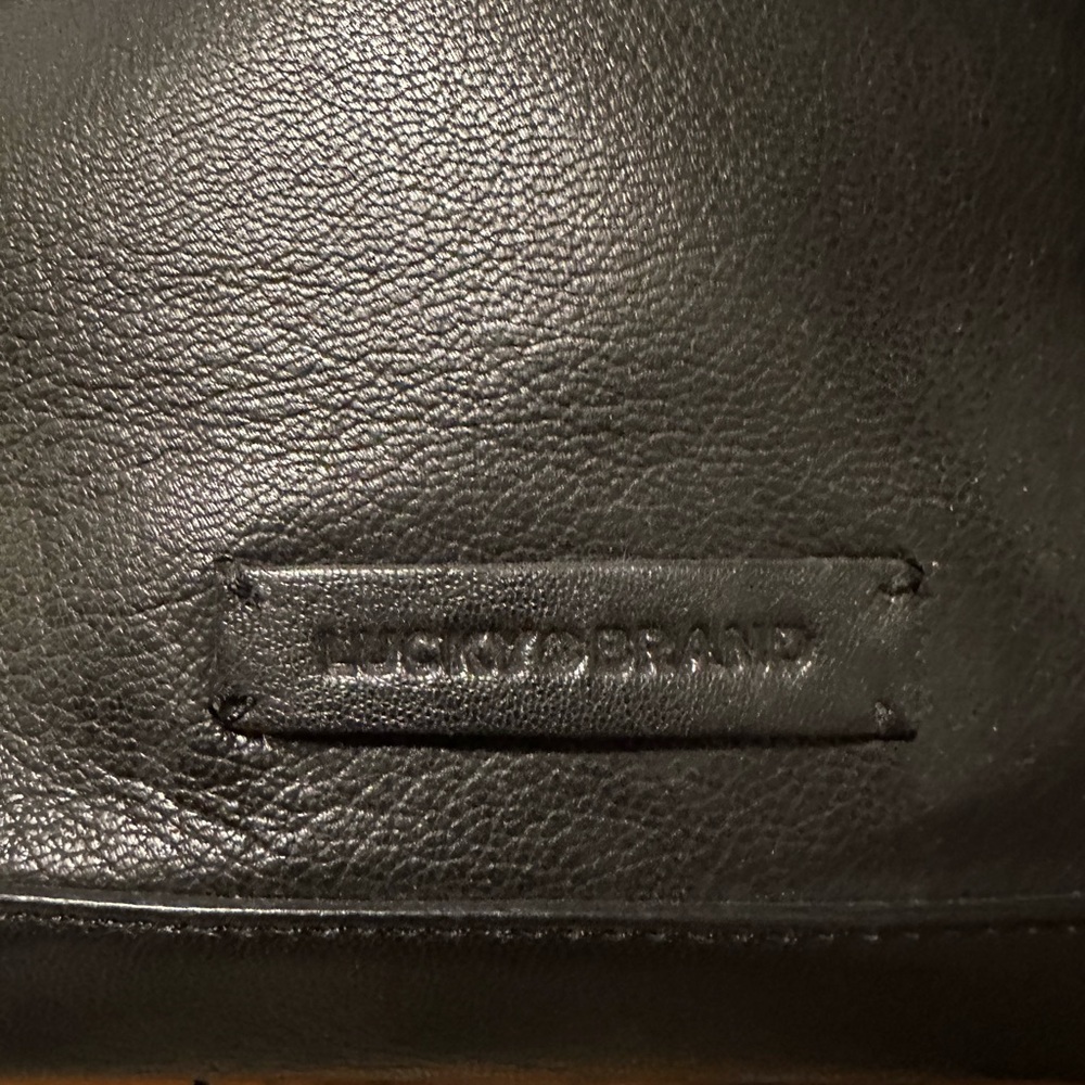 Lucky Brand leather purse. Brand new/never used.